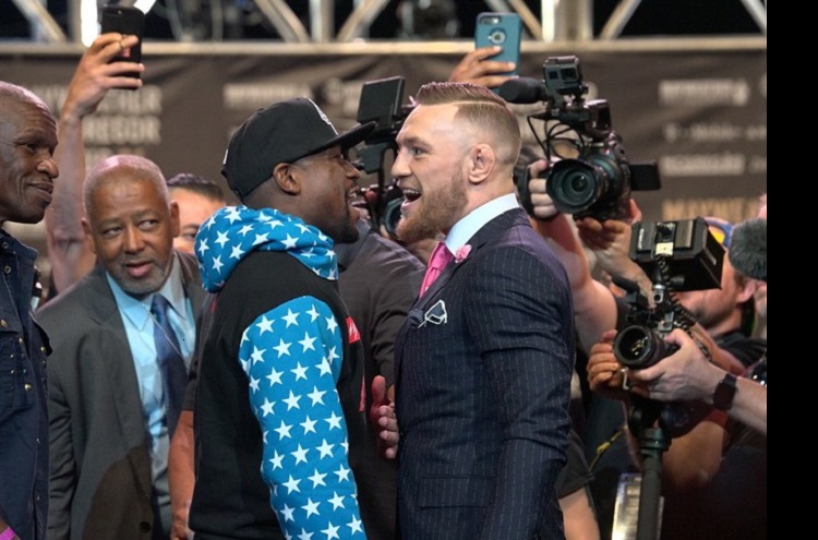 Conor McGregor provoca Mayweather em turnê: "Não passa de 4 rounds"