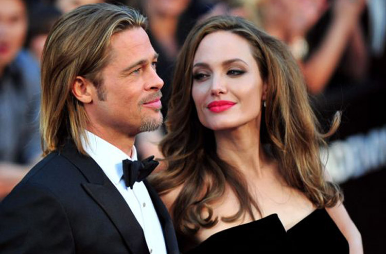 Angelina Jolie jogou todas as coisas de Brad Pitt no lixo